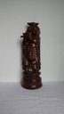Sculpture du dieu Krishna en bois de santal