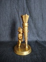 Pied de lampe en bronze doré représentant un putti et son carquois signé Henri Honoré Plé