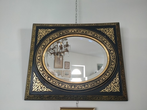 [A064/2] Miroir ovale cadre Napoléon III bois et stuc noirci motifs dorés